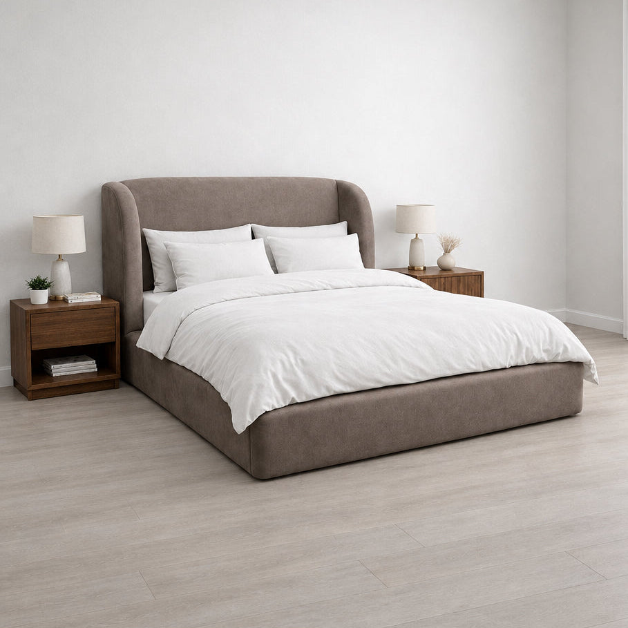 Bondi Platform Bed in taupe upholstery with curved winged headboard, styled in a bedroom - Candace & Basil