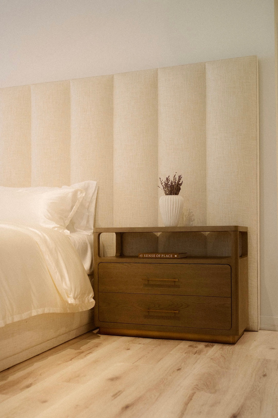 Night tables collection - upholstered bedside nightstand beside a custom bed - Candace & Basil