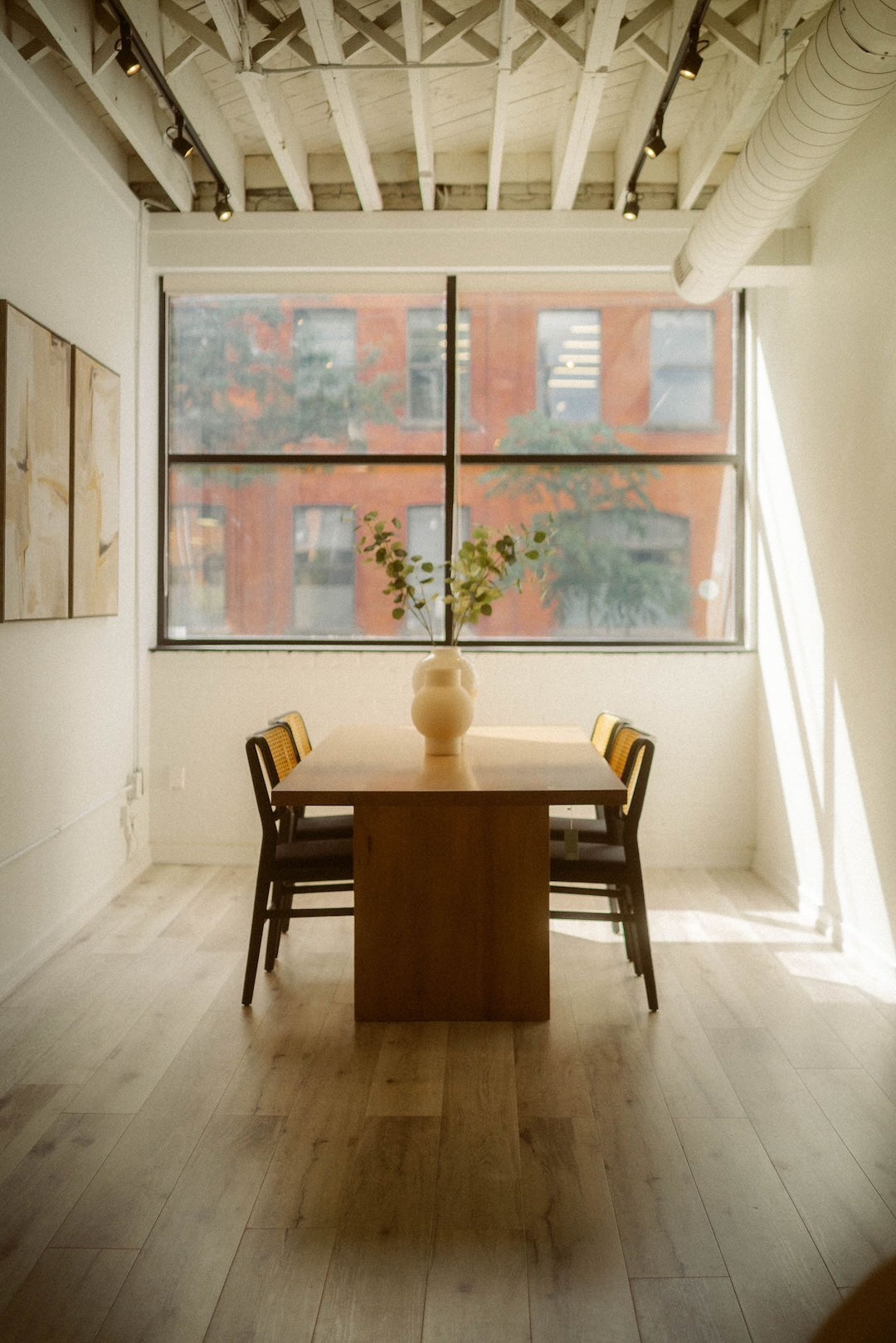 Custom dining tables collection - handcrafted wood dining table in a bright dining room - Candace & Basil